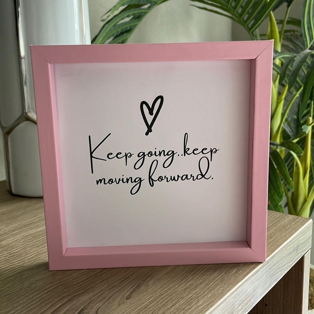 Inspirational wall art pink frame. "Keep going, Keep moving forward"